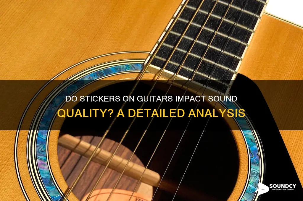 does putting stickers on a guitar affect the sound