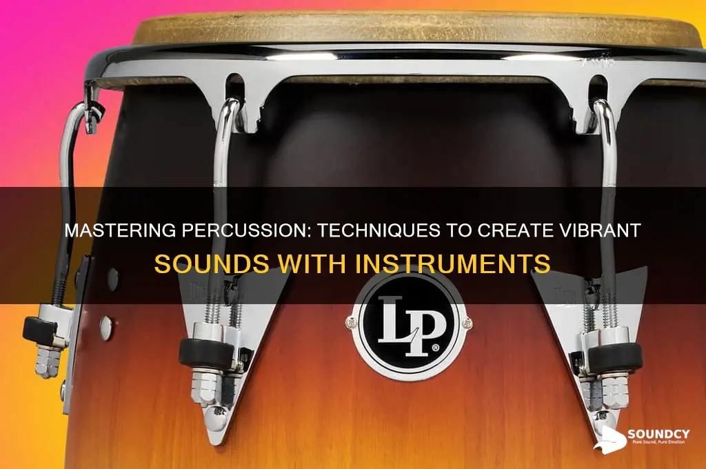 how do you make sound with a percussion instruments